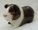 Quail Ceramics: Money Box: Guinea Pig. Long Hair Brown and White